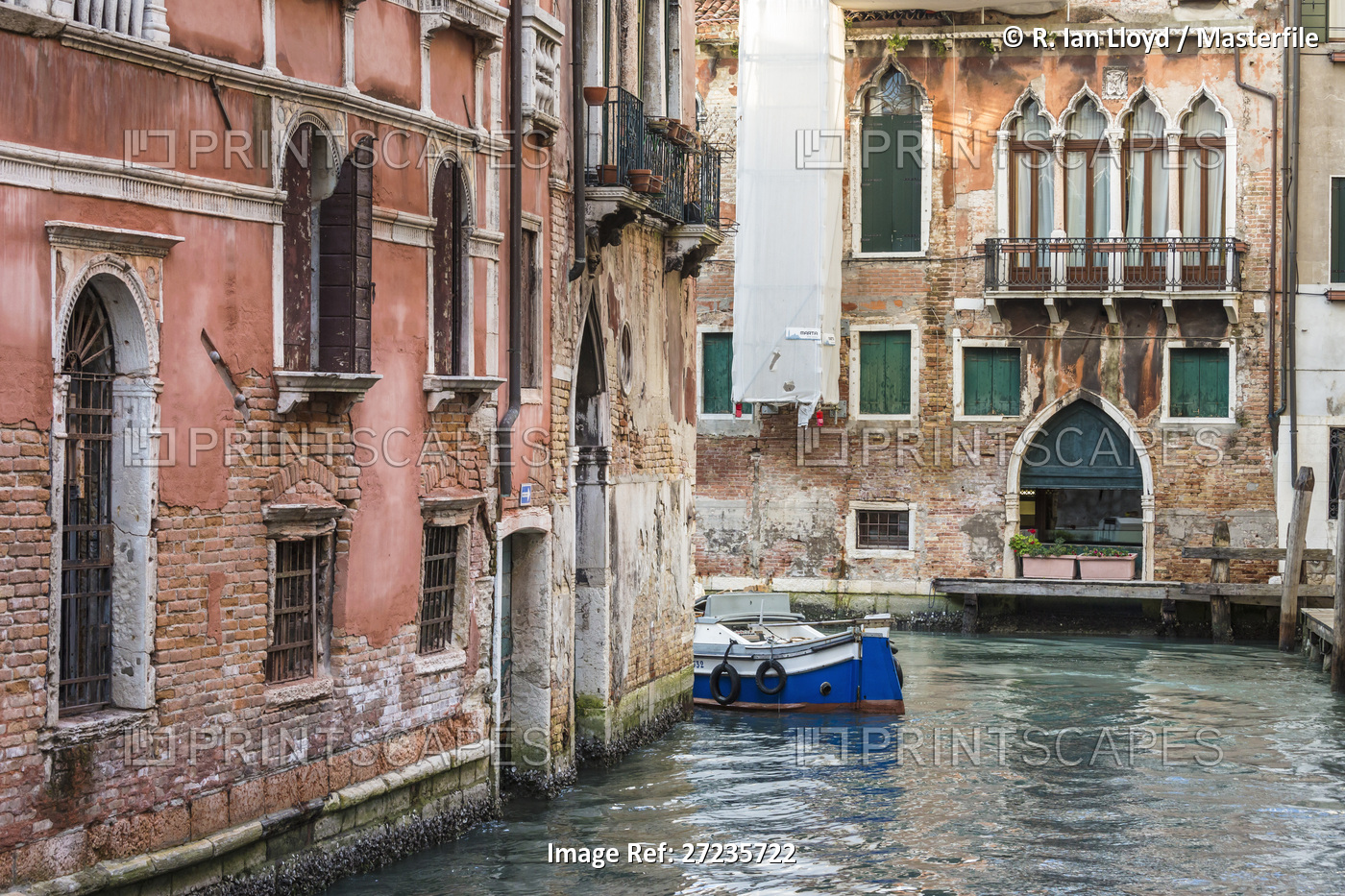 Historical buildings line a canal in Venice, Italy
